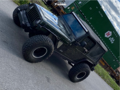 2006 Jeep Wrangler - 15x10 -38mm - American Racing Outlaw Ii - Stock Suspension - 35" x 12.5"