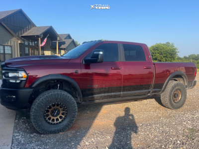 1 2024 2500 Ram Rebel Thuren Leveling Kit Method Mr305 Bronze With A Black Simulated Beadlock