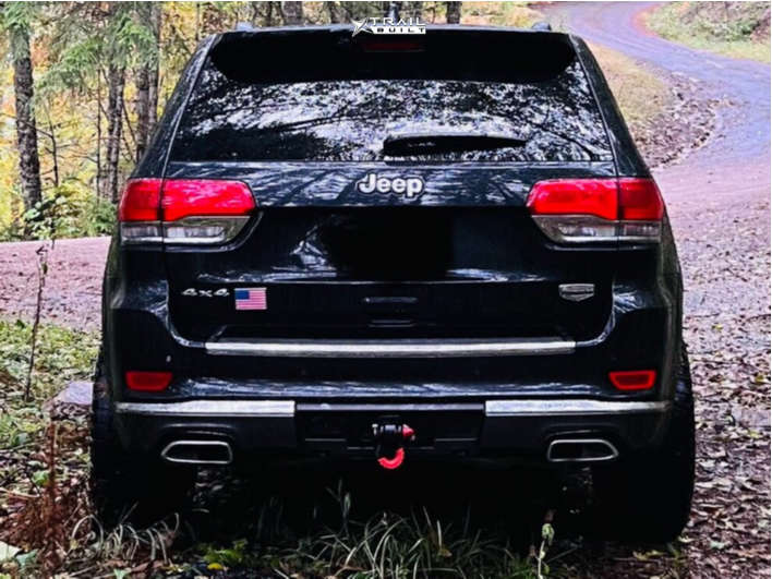 2014 Jeep Grand Cherokee Wheel Offset Aggressive > 1" Outside Fender