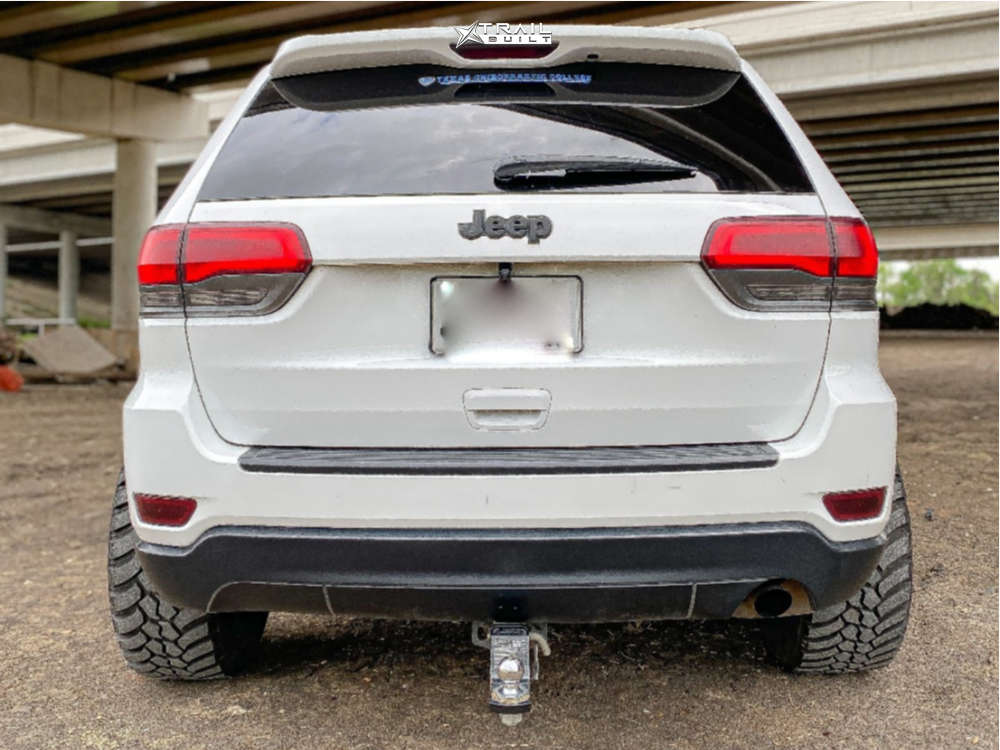 2014 Jeep Grand Cherokee Wheel Offset Aggressive > 1" Outside Fender