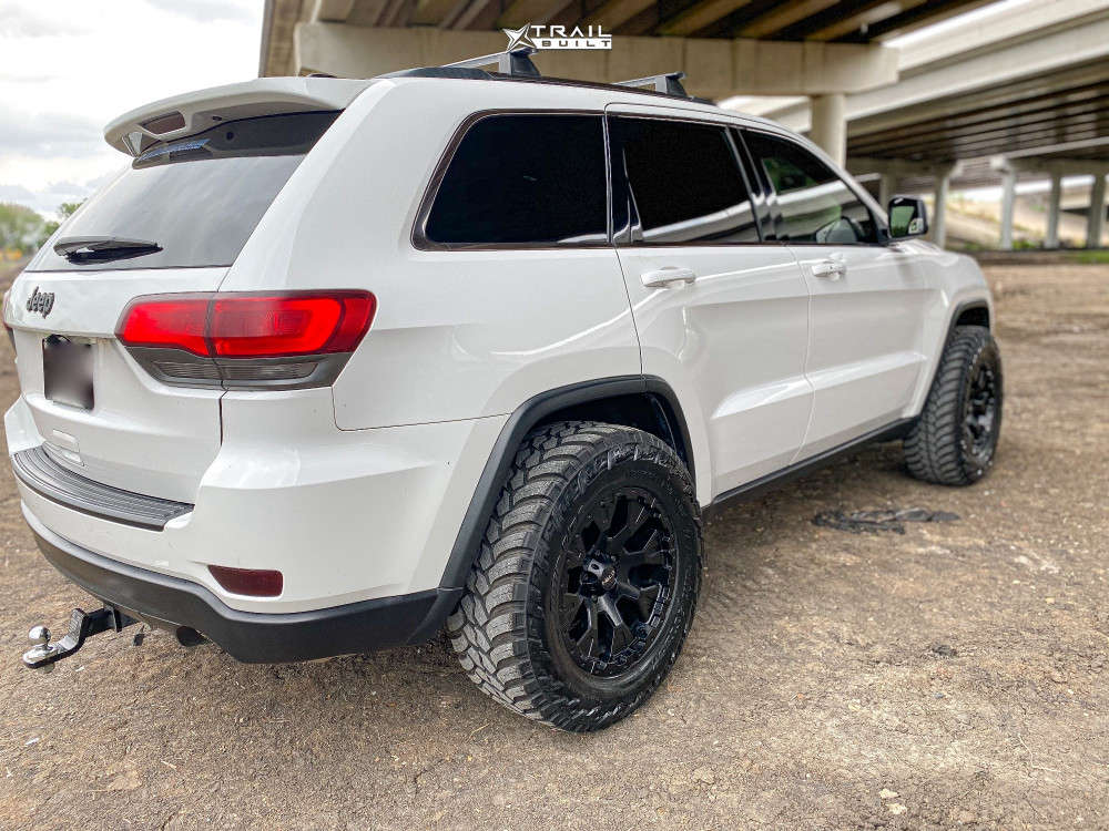2014 Jeep Grand Cherokee Wheel Offset Aggressive > 1" Outside Fender